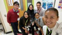 Pediatric residents stop to take a group selfie at Harlem Hospital.